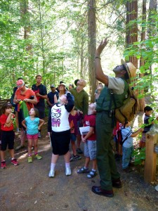 Shelton Johnson, a ranger featured in the PBS series, leads a junior ranger walk